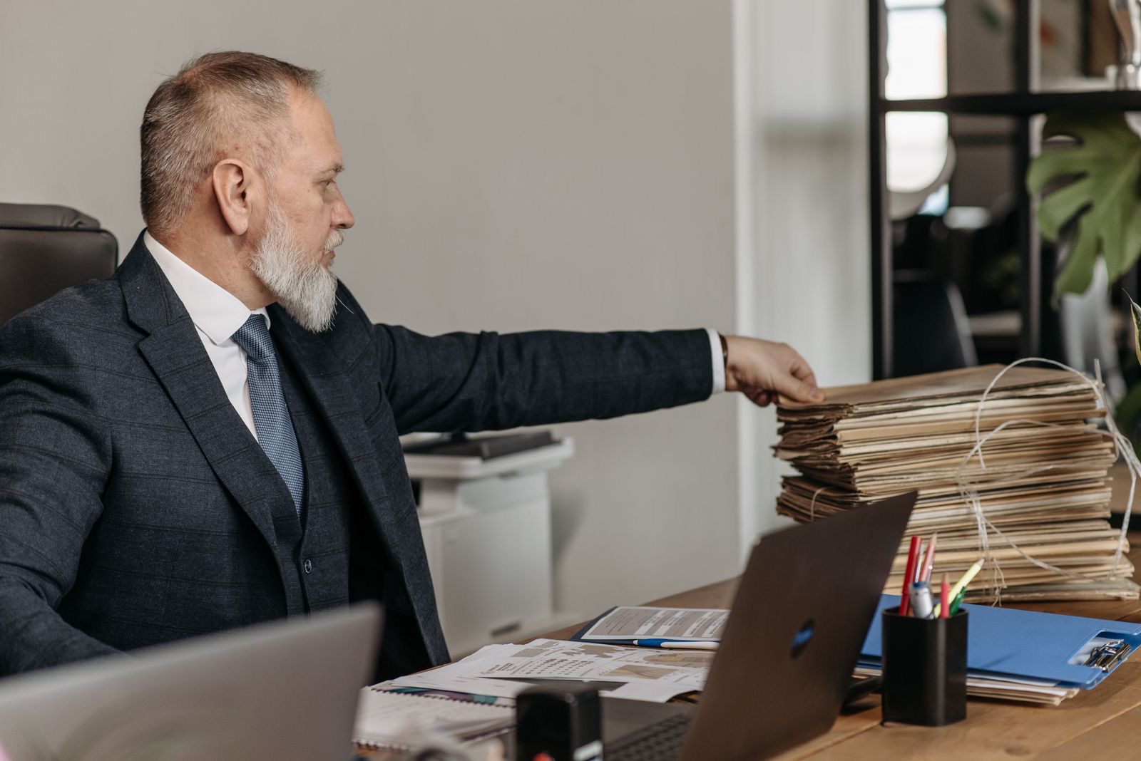A reception desk with a folder of paperwork